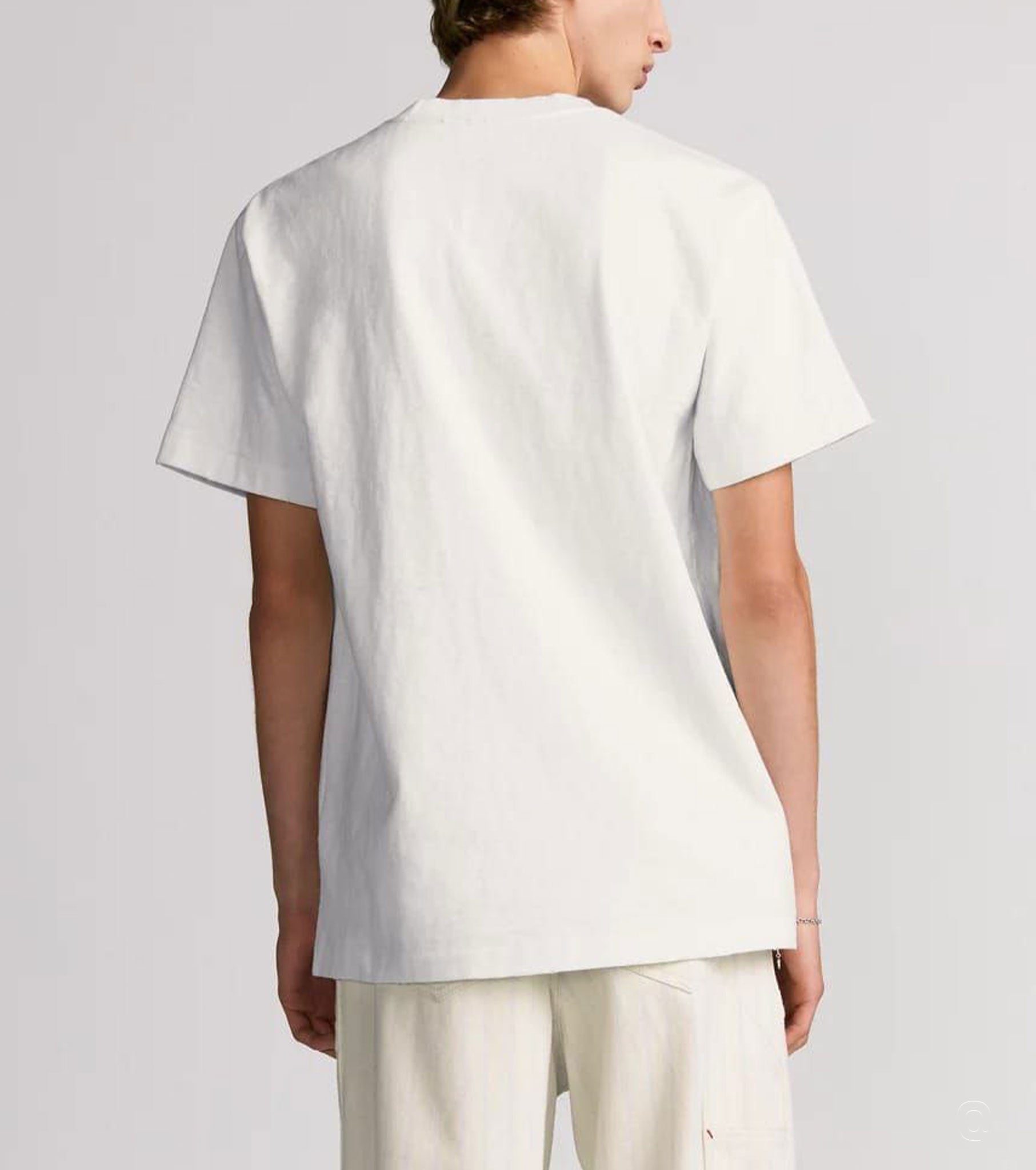 Back of model wear Hylton Nel t-shirt in white - Fashion Dose